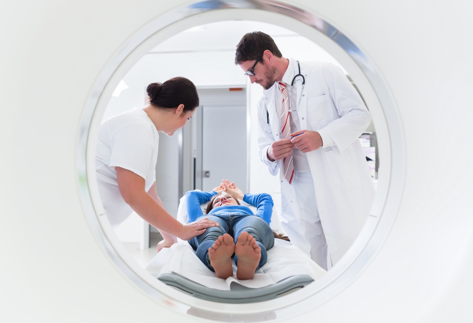 Patient about to get an MRI while a doctor and nurse make her comfortable at Premier Diagnostic Imaging in Cookeville, Tennessee